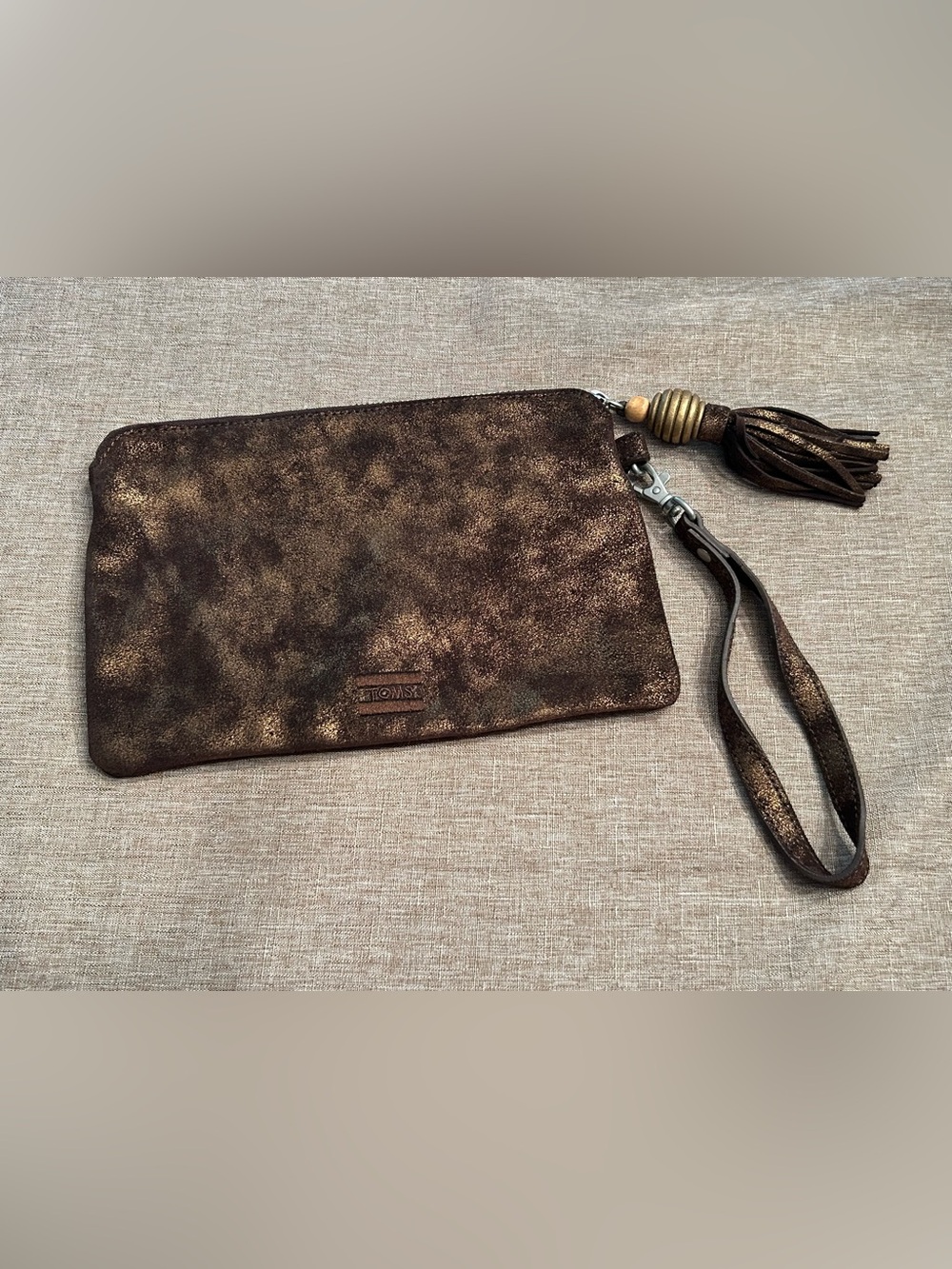 TOMS Sightsee Metallic Pouch Wristlet Gunmetal Black Gold Leather Tassel
